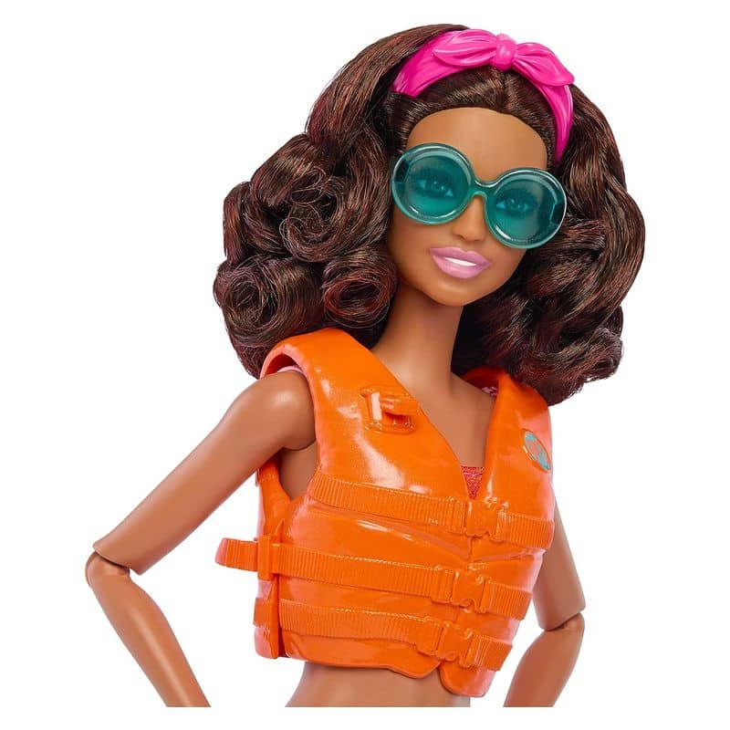 Muñeca Barbie surfista con tabla malibu y bañador rosa Mattel HPL69 - Imagen 3